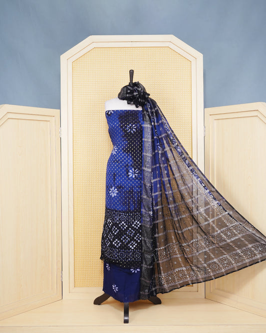 Navy Blue Georgette Salwar material Features a Vibrent Tie Dye Pattern Aborned With Shimmering Metallic Gold foil Dots,pired with matching bottom & elegant Duptta