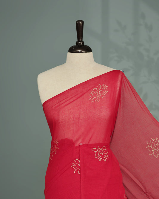 Magenta colour pure mul cotton saree featuring Minimal Lotus Print on body, Clean Borderless design, elegant tassels.
