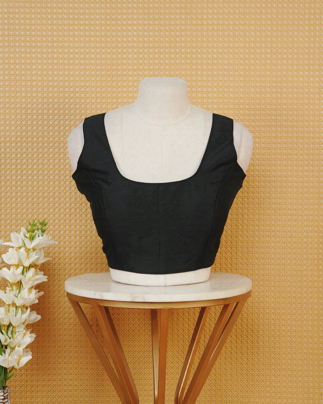 Black Colour Plain Blouse Featuring A Classic U Neckline, Sleeveless Design, And A Simple, Clean Finish.