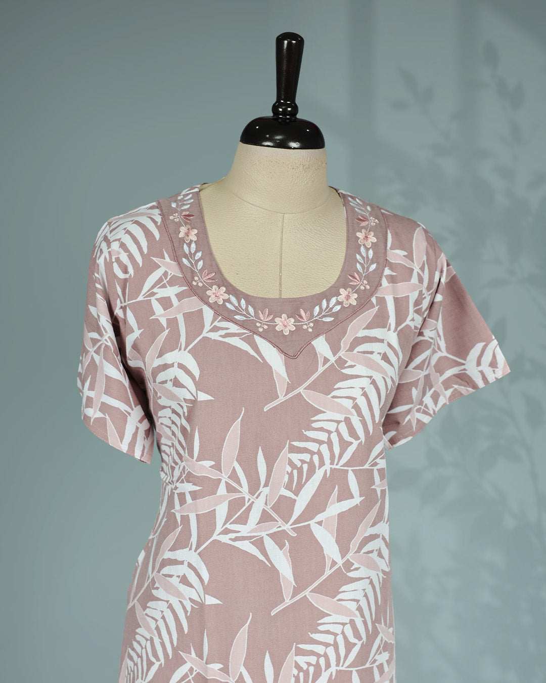 Dusty mauve pink colour nighty featuring white leaf prints on body, an embroidered round neckline and an ankle-length fit.