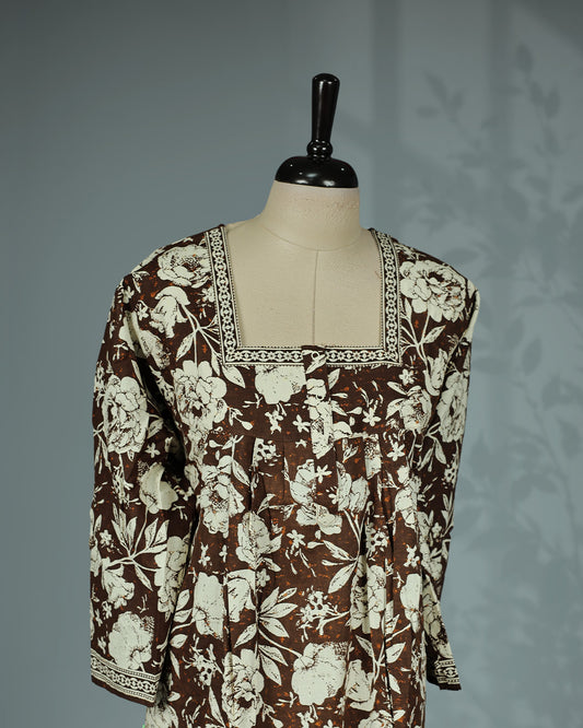 Olive Brown colour nighty featuring cream floral prints on body , an openable button-front square neckline with a printed border, three-quarter sleeves, front gathers and an ankle-length fit.