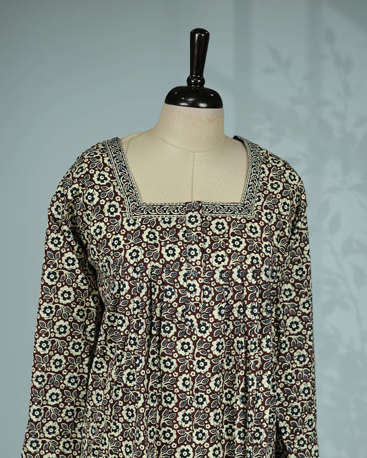 Brown & cream floral printed nighty with an elegant square neckline full sleeves, delicate printed border detailing, front button placket and a graceful full-length fit.