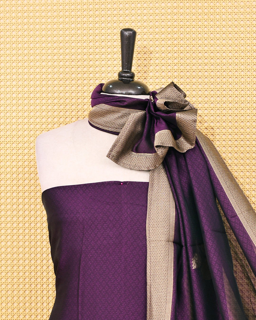 Purple colour Banaras salwar material featuring Zari floral work on body, paired with Matching bottom & dupatta.