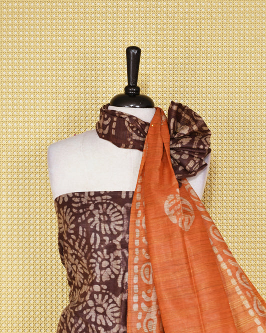 Brown colour with  Batik Printed chanderi Salwar Material paired with a Rust Orange printed bottom and a matching contrast dupatta.