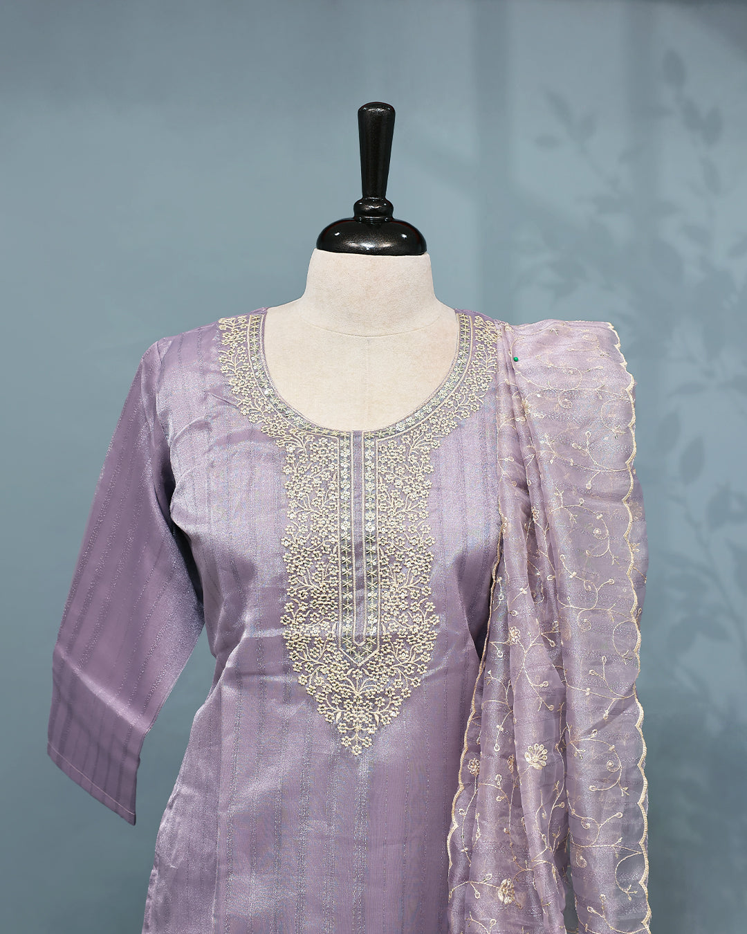 Lavender colour salwar set with Sequins & thread work on top, paired with matching bottom & Dupatta.