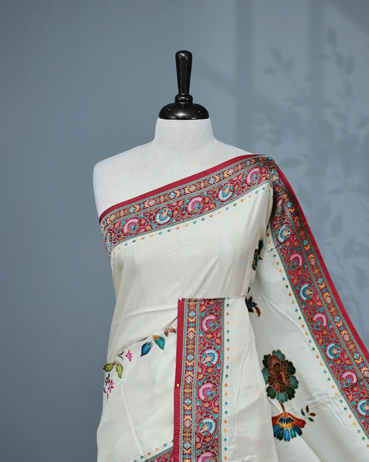 Cream Colour Pashmina Saree featuring a Patterned body, complemented by Contrast Magenta colour with Floral pattern & gold zari on border and Pallu, comes with matching blouse piece.