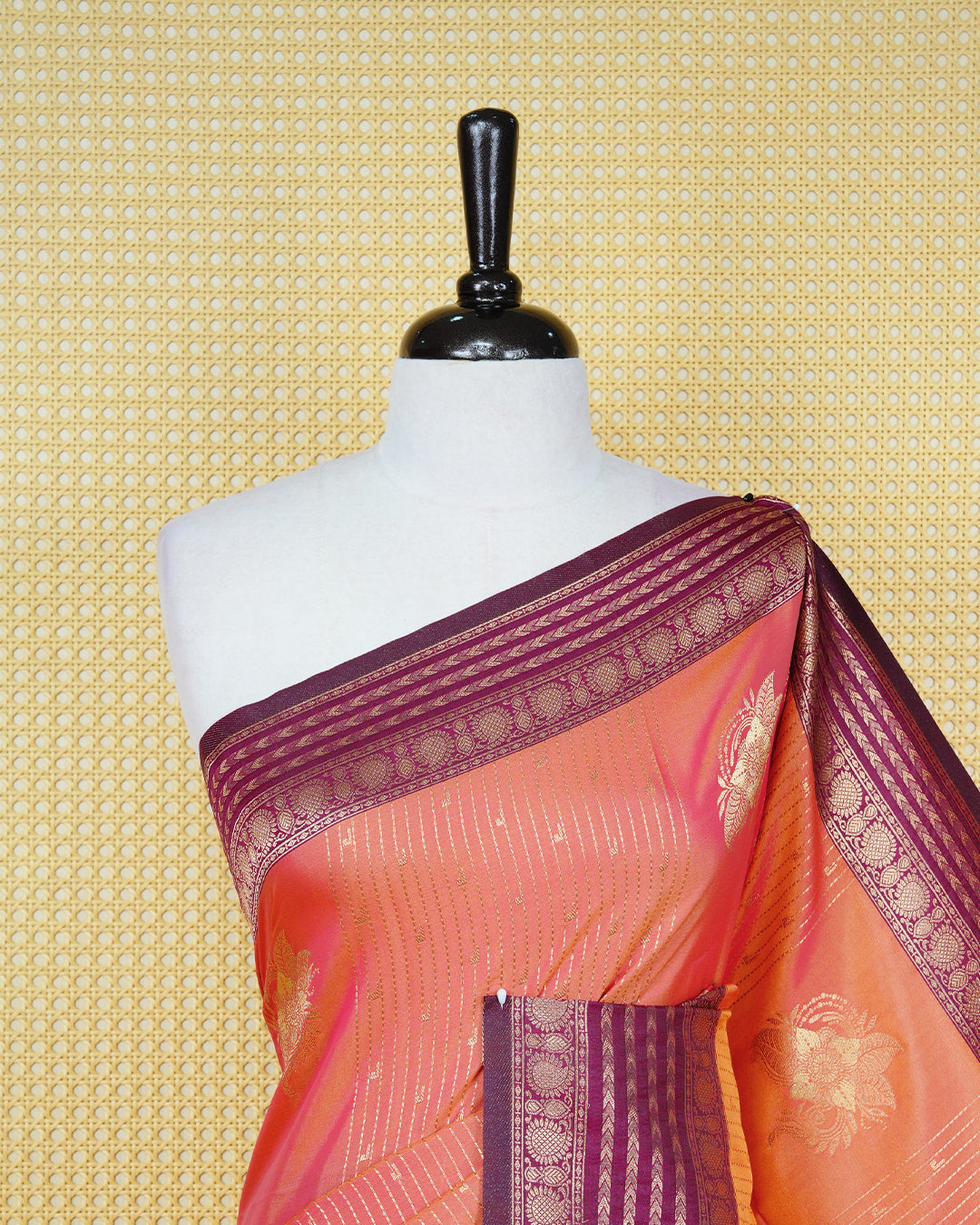 Rust orange & gold double shade Mulberry silk saree featuring floral gold zari patterns on body, paired with contrast purple colour with traditional border, comes with matching blouse piece.