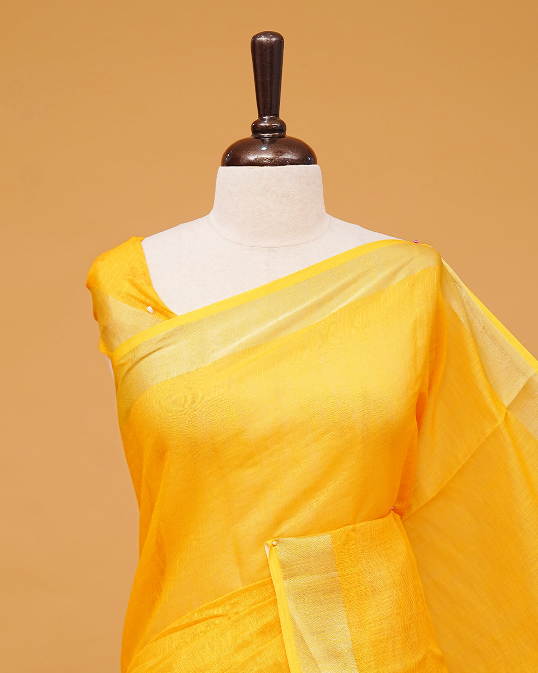 Sunny Yellow Colour Semi Linen Saree featuring Bold Flower prints, paired with matching blouse piece.