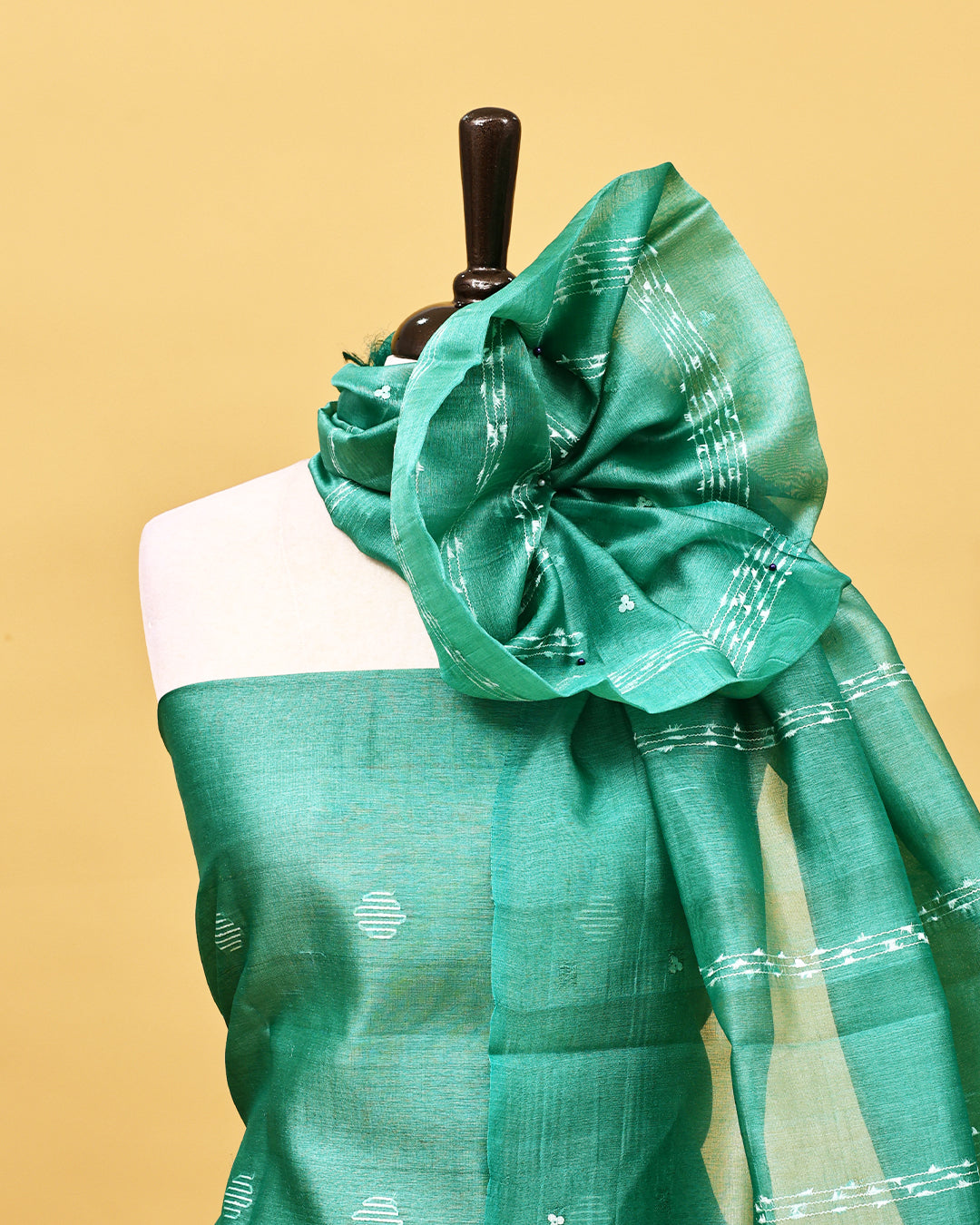 Pastel green colour Tissue Salwar material with thread work on body, matching bottom & Dupatta.