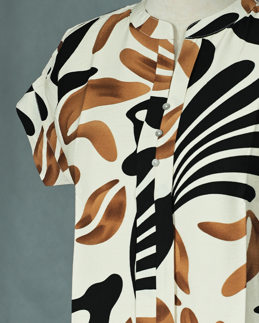 Off White colour Black & Brown Print work on body, Round collar Neck design, With sleeve.