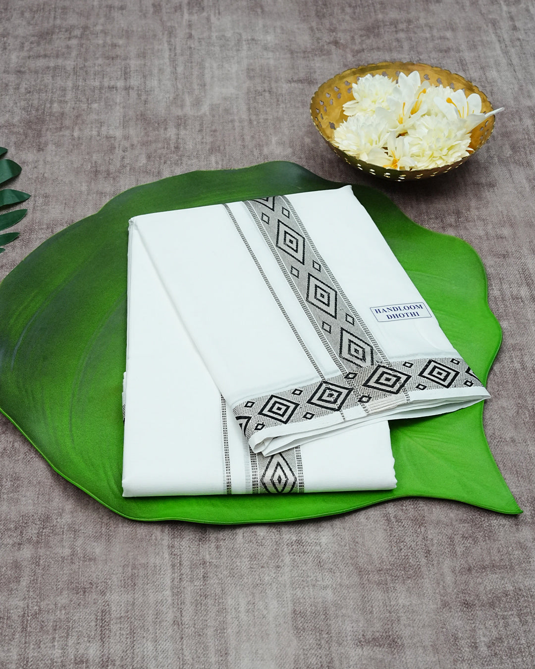 Off White Colour  Handloom Cotton Double Dhoti Finished With A Black Designed Pattern On Rose Gold kara.