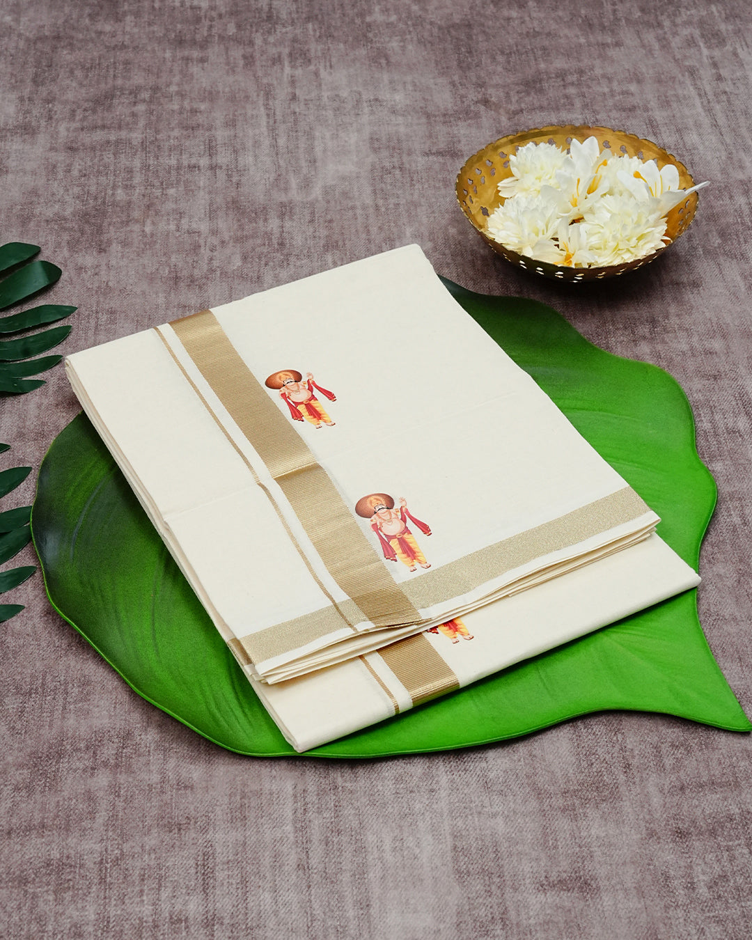 Off White Cotton Double Dhoti Finished with Onam Themed Prints & Classic Light Gold Kara