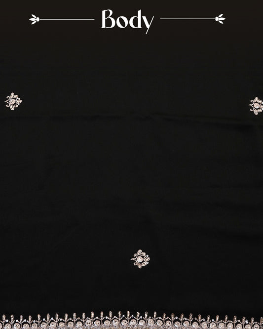 Black colour Chiffon Designer saree featuring Beats & Sequins Motifs on body and worked border, comes with matching blouse piece.