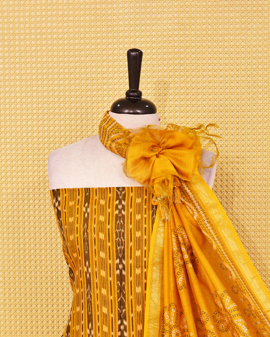Mustard Yellow colour Cotton Salwar Material featuring elegant ikat inspired vertical stripes on the kurta, paired with a matching solid bottom and a beautifully printed dupatta