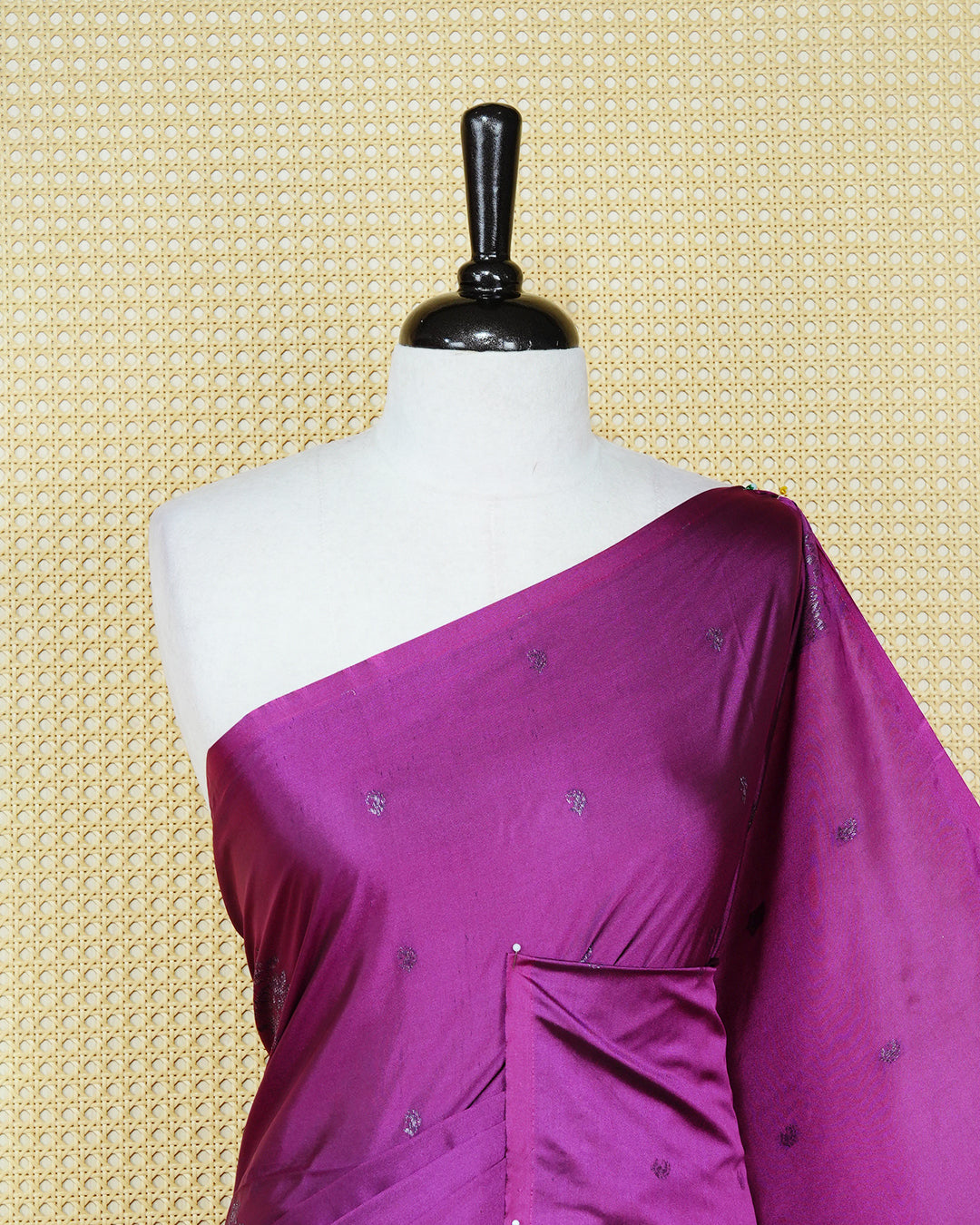Dark magenta colour soft silk saree featuring antique zari motifs on body with contrast self colour pallu & paired with matching blouse piece.