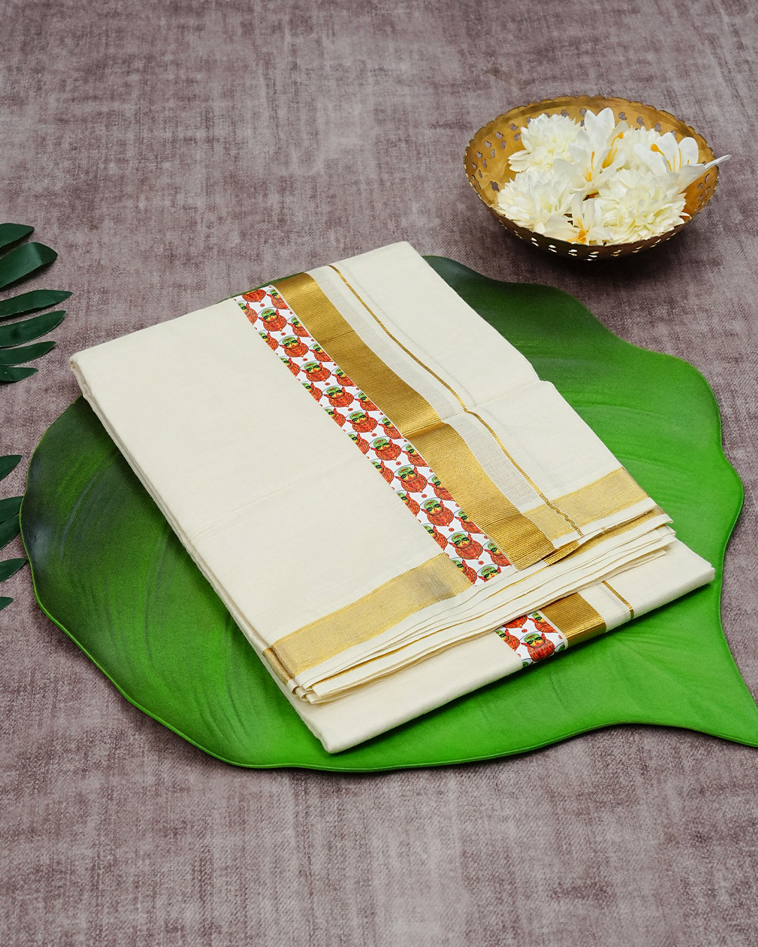 Cream Coloured Cotton Double Dhoti Finished with Traditional Art Form Prints & Gold Kara