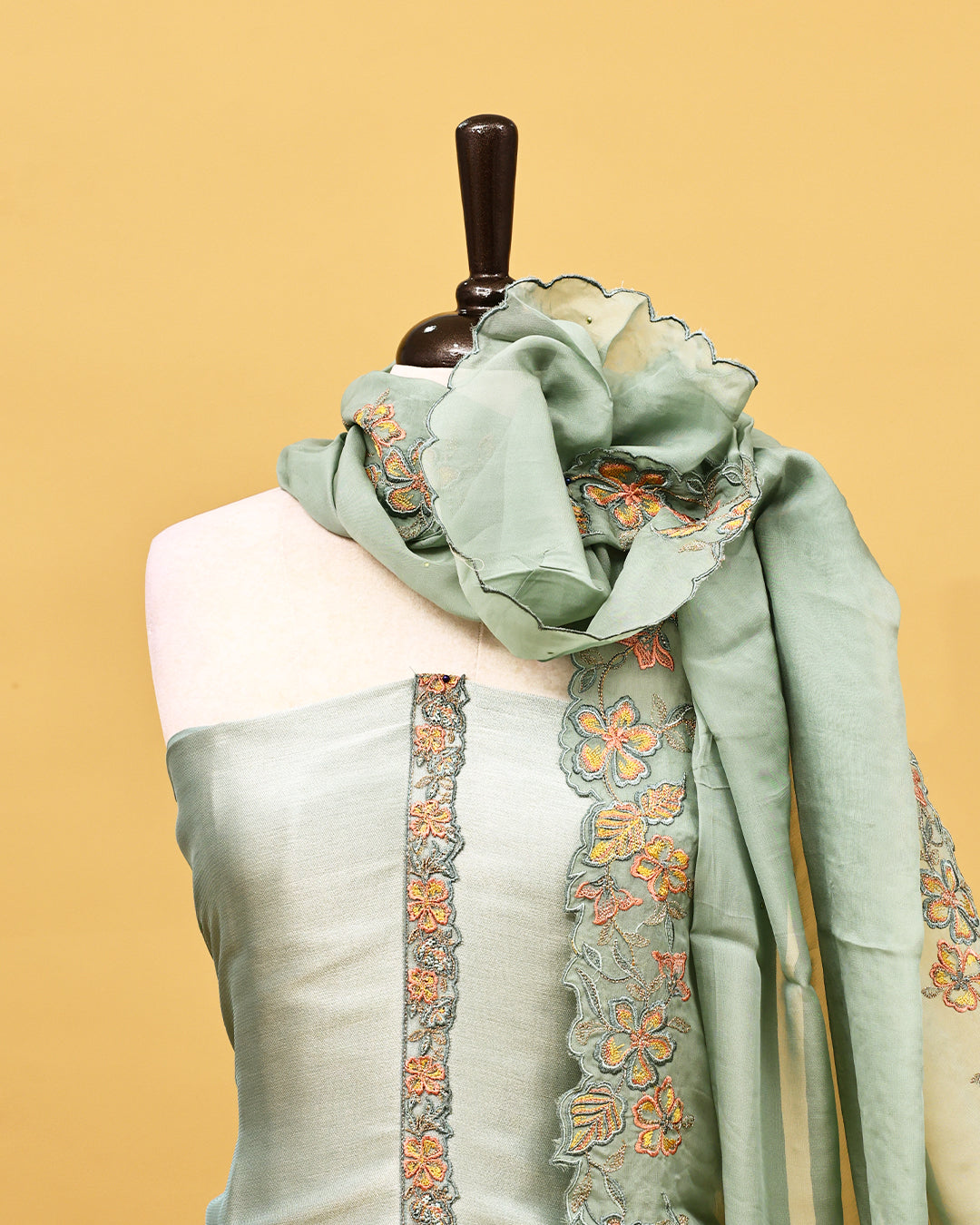 Pastel Aqua colour Organza Salwar material with Thread work on body, matching bottom & Dupatta.