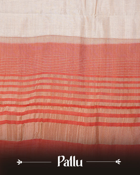 Light gold tussar saree featuring Elegant plain body, complemented by contrast Red colour with Gold zari Floral kodi with Elephant Pattern border, comes with matching blouse piece.