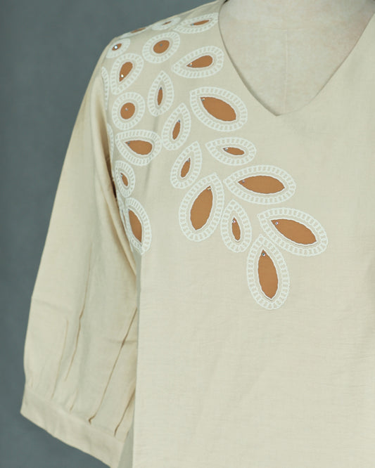 Cream colour Top with Thread work on body, V Neck design, With sleeve.