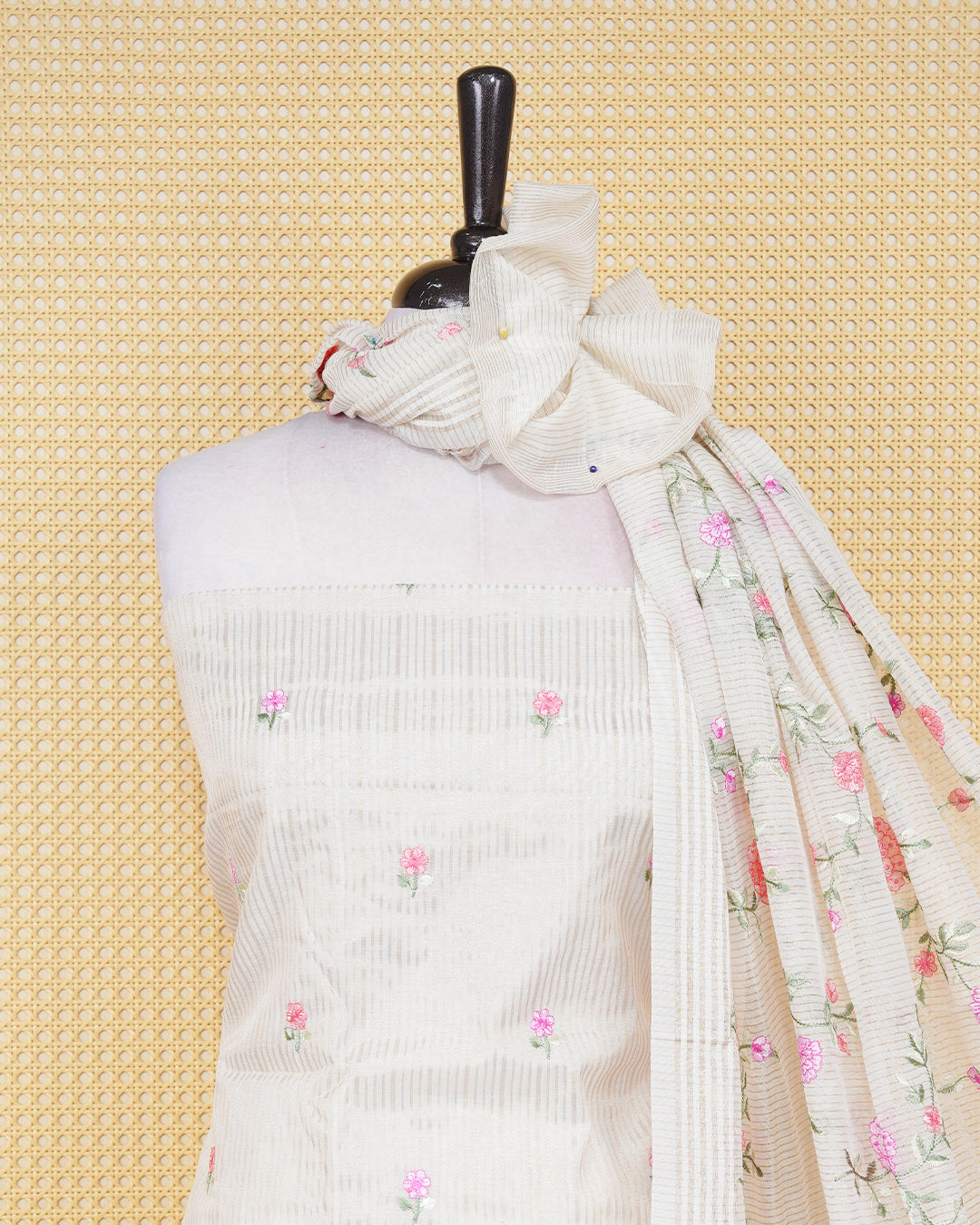 Cream colour tissue salwar material featuring striped body with elegant floral Thread Work, paired with a matching bottom and an elegant dupatta.