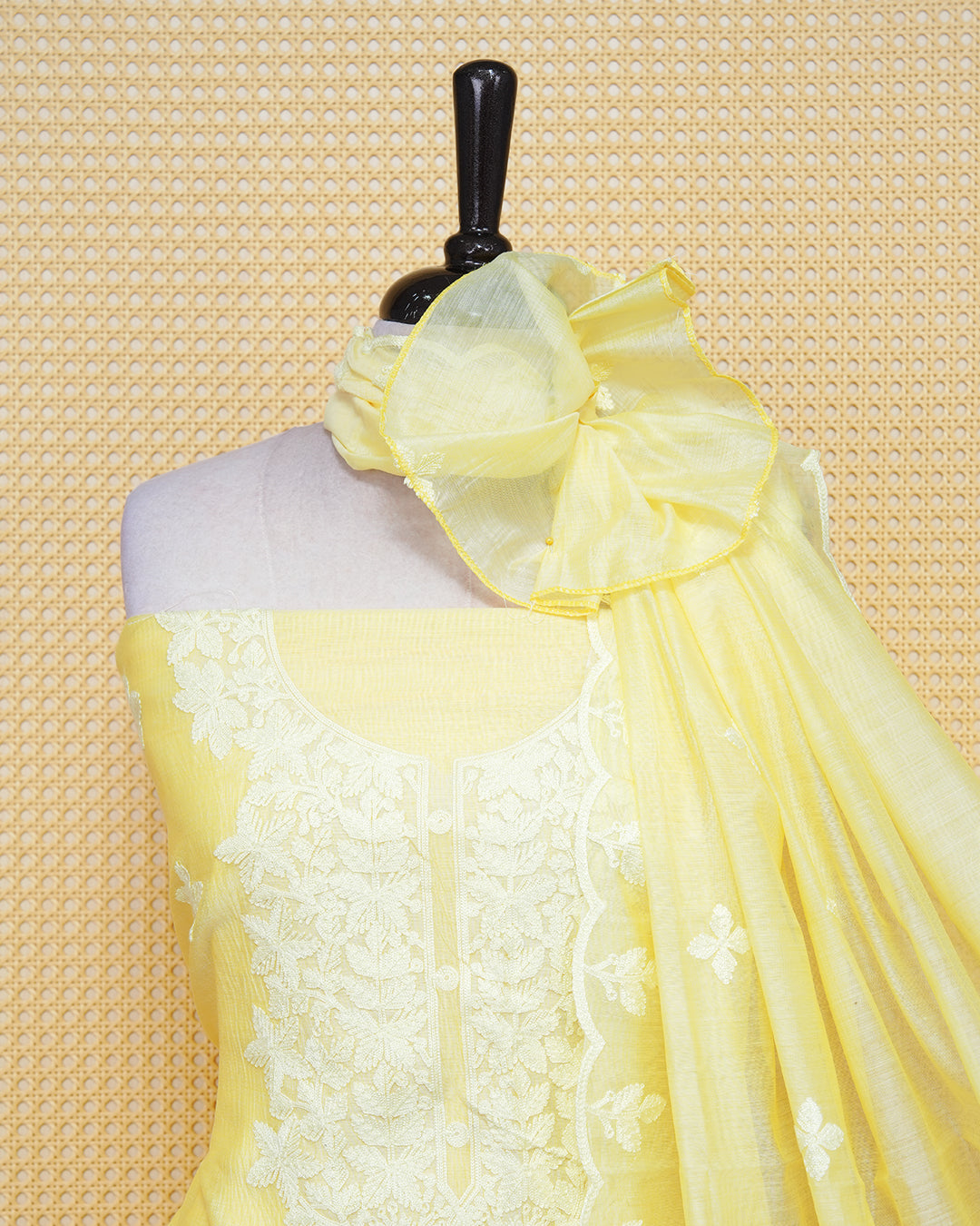 Pastel yellow salwar material featuring chikkankari work on body, comes with matching Bottom piece & Dupatta