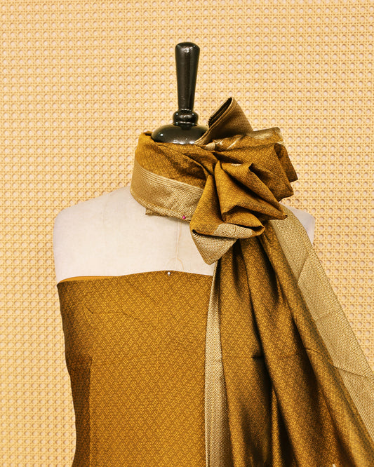 Golden Olive colour Banaras salwar material featuring Zari floral work on body, paired with Matching bottom & dupatta.