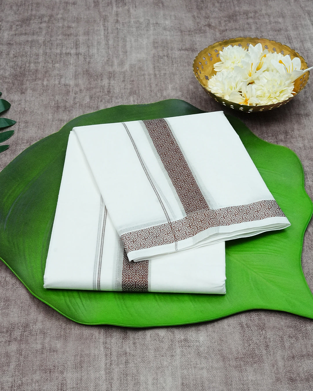 Off White Colour Cotton Double Dhoti Finished With A Brown Designed Pattern On Silver kara.