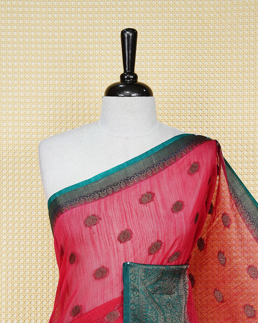 Dark maroon colour semi linen saree thread motifs on body, contrast bottle green colour gold zari border, rich pallu comes with matching blouse piece