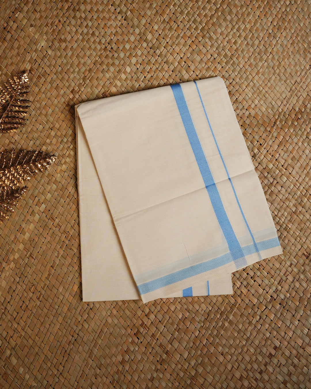 Cream colour cotton single dhoti featuring Light blue colour border.