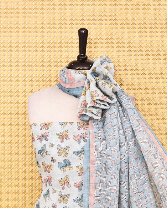 Pastel blue colour linen Salwar Material featuring delightful multicolor butterfly motifs, paired with a classic white bottom and a beautifull dupatta