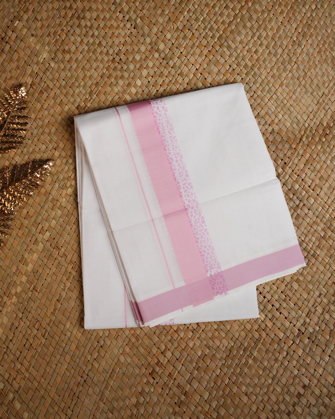 White colour cotton Double dhoti featuring Pink with geometric pattern border.