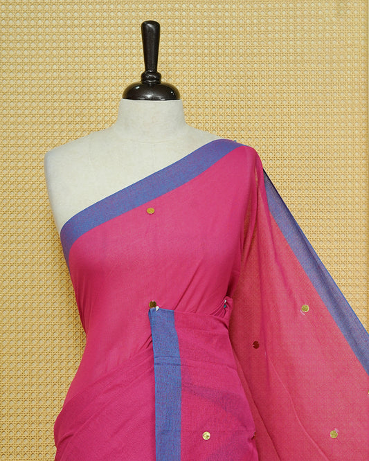 Magenta colour Mul cotton saree featuring Gold Sequins, complemented by Contrast Blue simple Border & tassels.