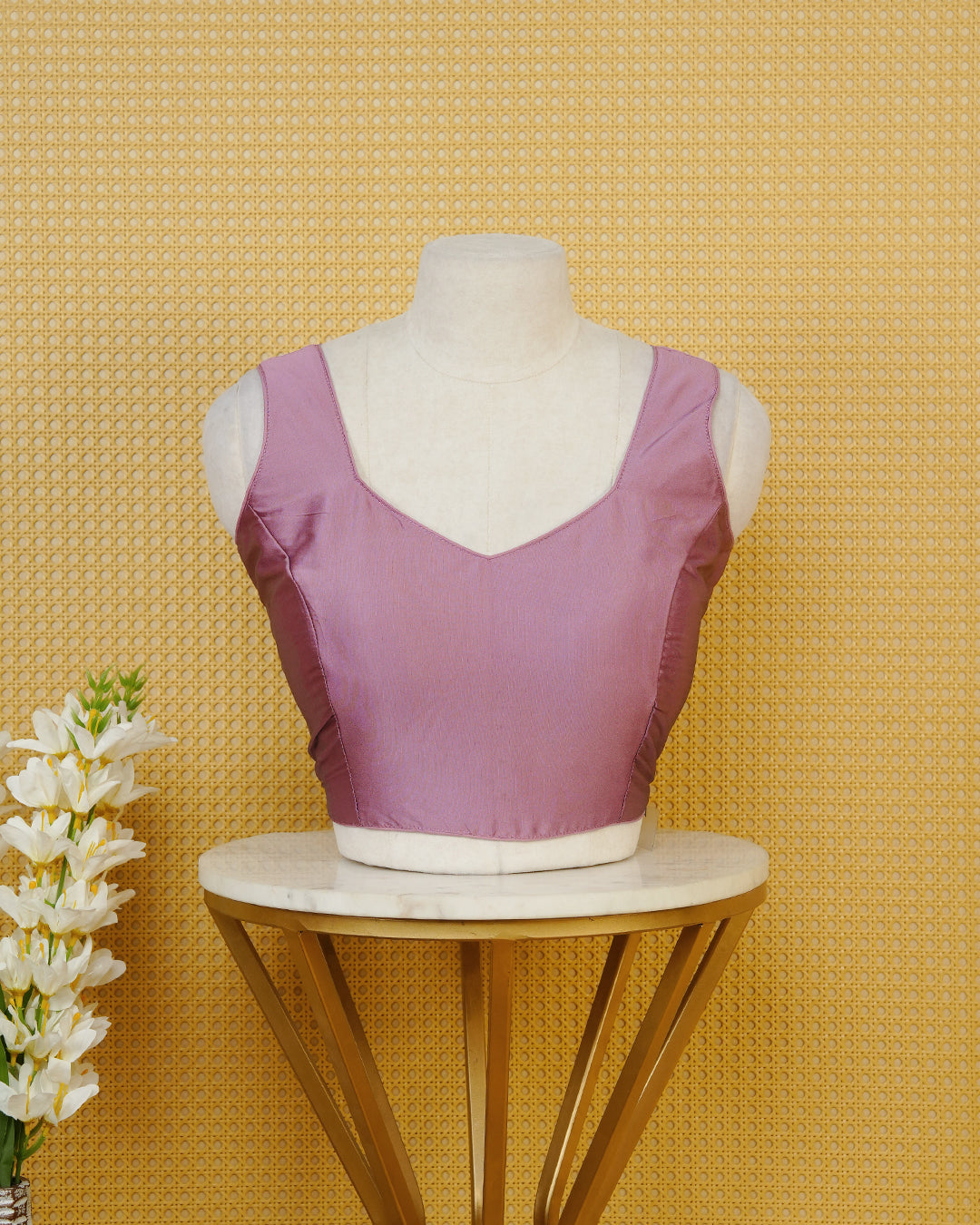 Pink colour Sleeveless Blouse Featuring A Stylish Sweetheart Neck, Smooth Finish, And A Comfortable Tailored Fit.