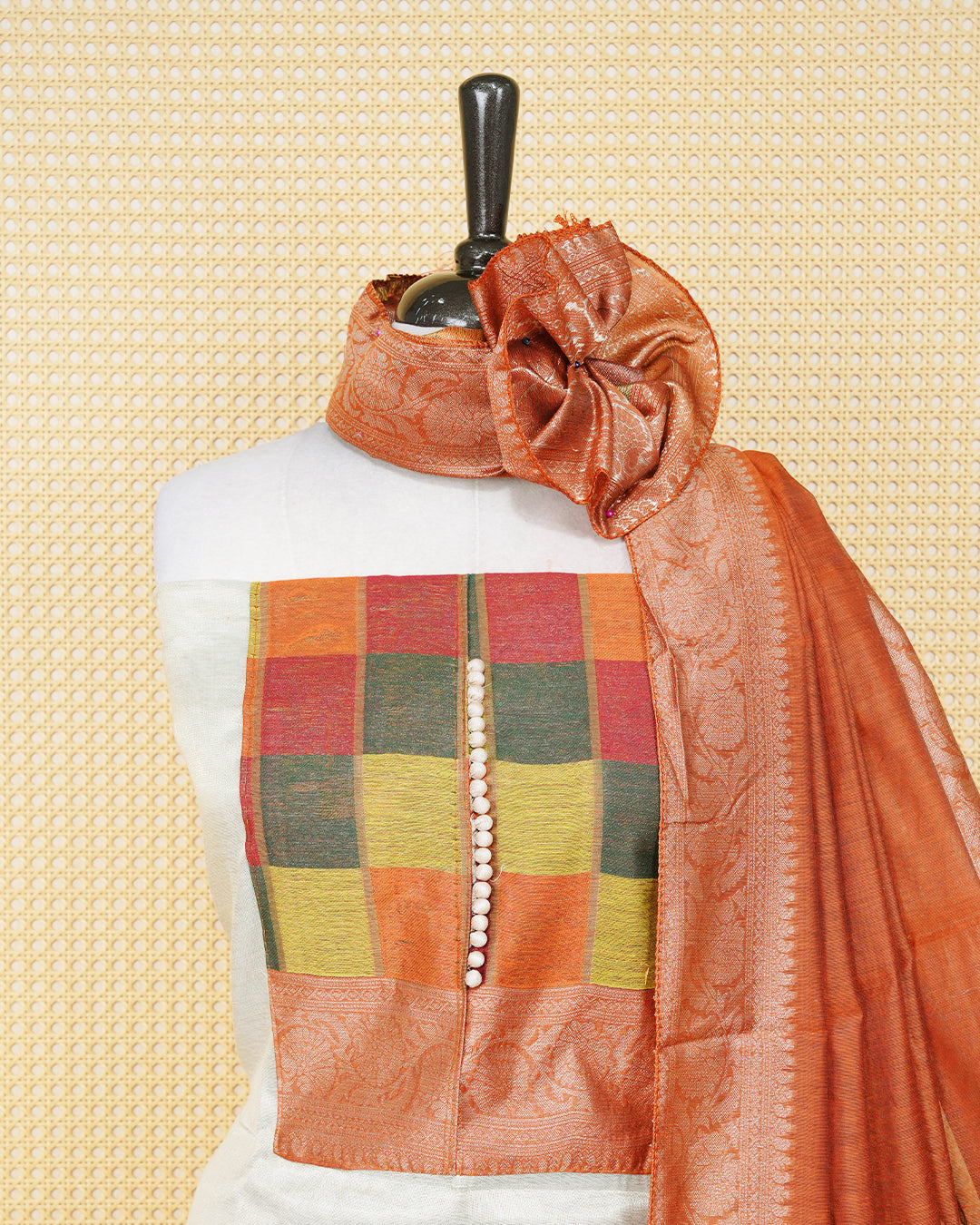 Cream colour Tissue Salwar Material Featuring  Plain Body, multi colour check pattern on chest portion, Paired With a Matching Bottom and an Elegant Dupatta.