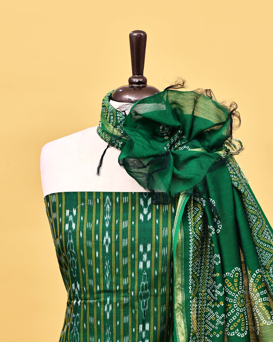Green colour cotton Salwar material with Strip pattern on body, matching bottom & Dupatta.