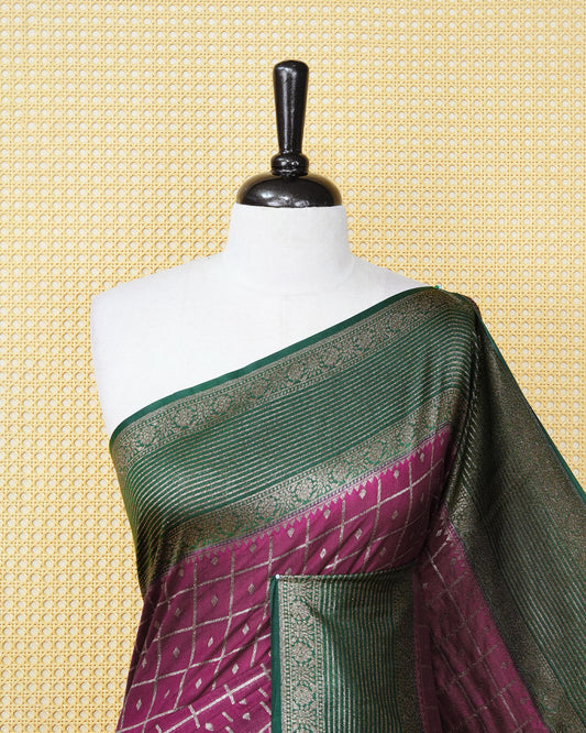 Grape Colour Semi georgette Saree having zari check with buttas pattern on body, contrast dark green colour floral designed border, Rich Pallu comes with Matching Blouse piece.