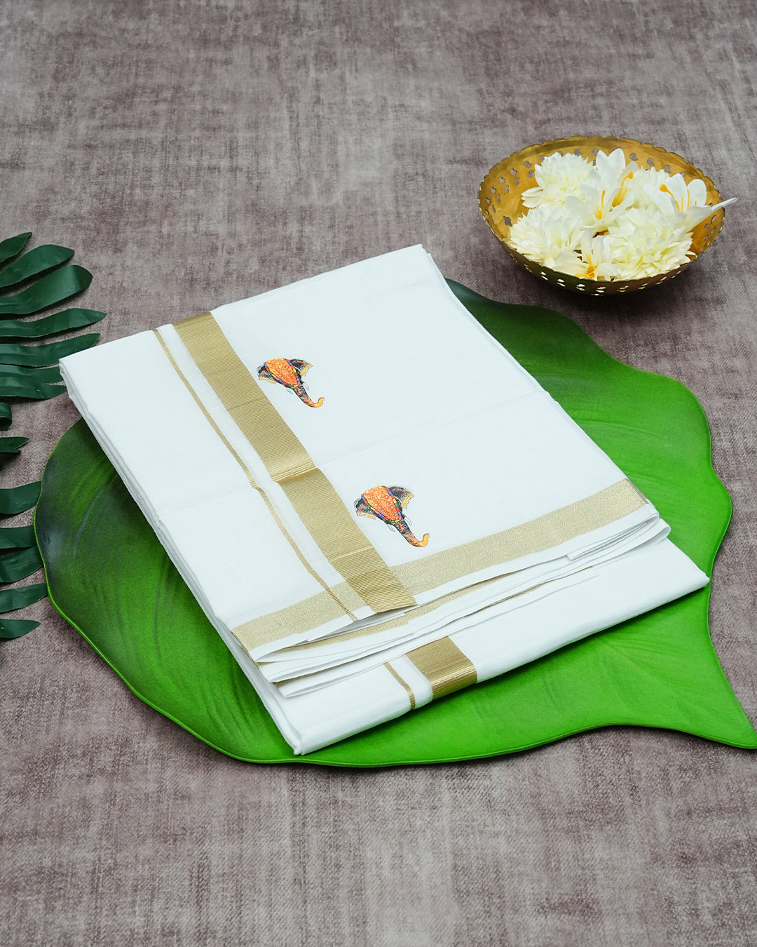 Cream-Coloured Cotton Double Dhoti Finished with Nettipattam Prints & Gold Kara