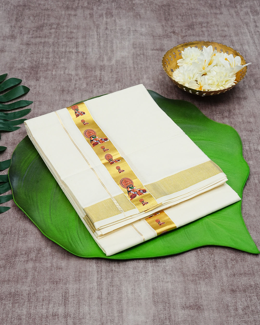 Cream Coloured Cotton Double Dhoti Finished with Kathakali Prints On Gold Kara