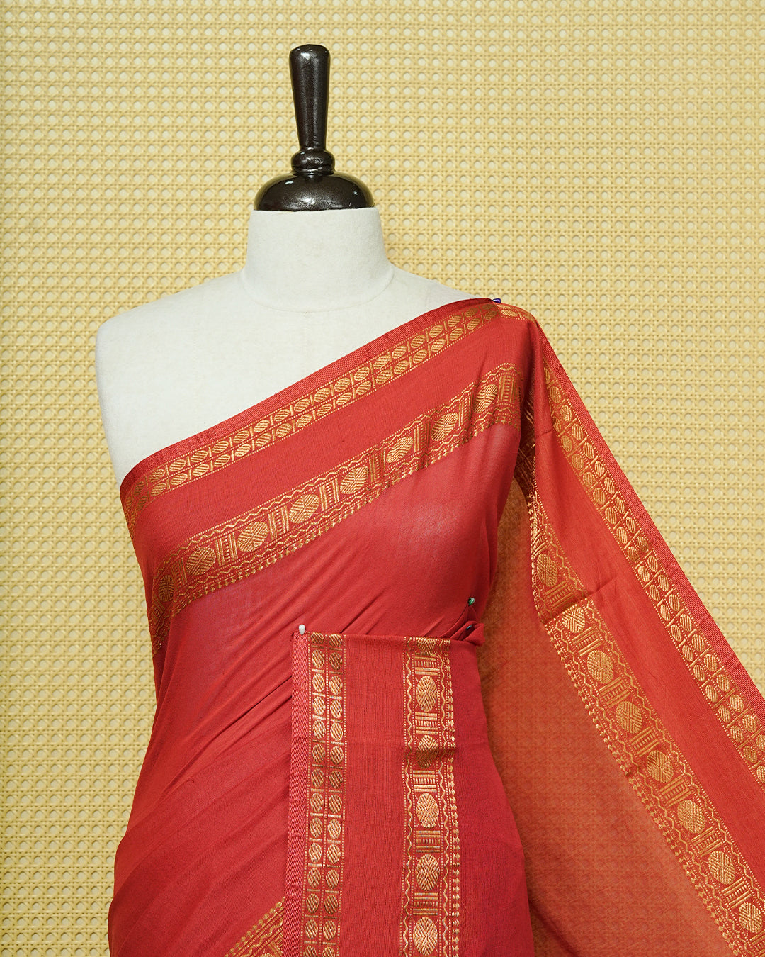 Red colour Mul cotton saree featuring Elegant plain body, complemented by Self colour Gold zari border & tassels.