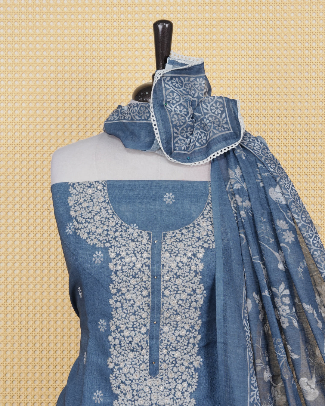 Dusty Blue colour Net kota salwar material featuring elegant Threadwork on neck portion & floral prints on body, paired with a matching bottom and an elegant dupatta.