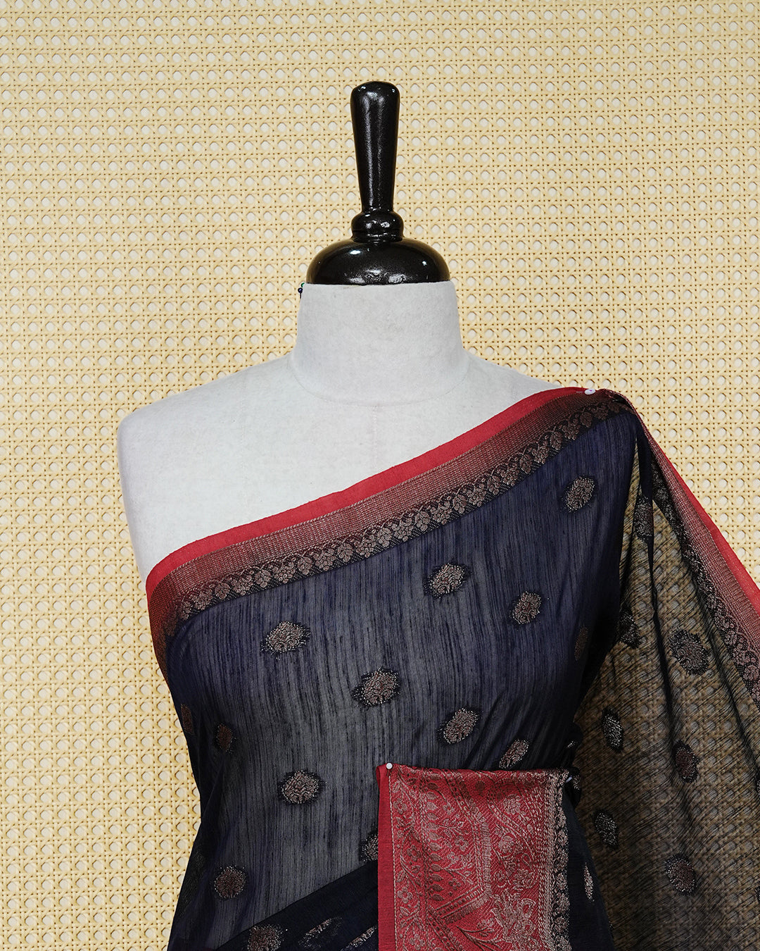 Navy blue colour semi linen saree thread motifs on body, contrast red colour gold zari border, rich pallu comes with matching blouse piece
