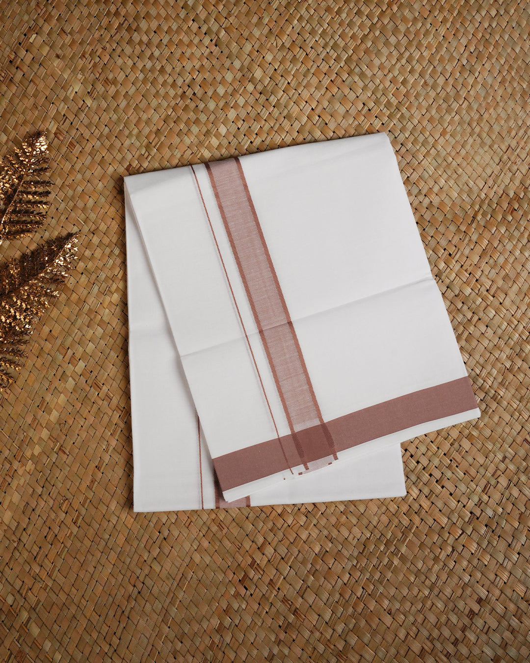 White colour cotton single dhoti featuring Light brown border.