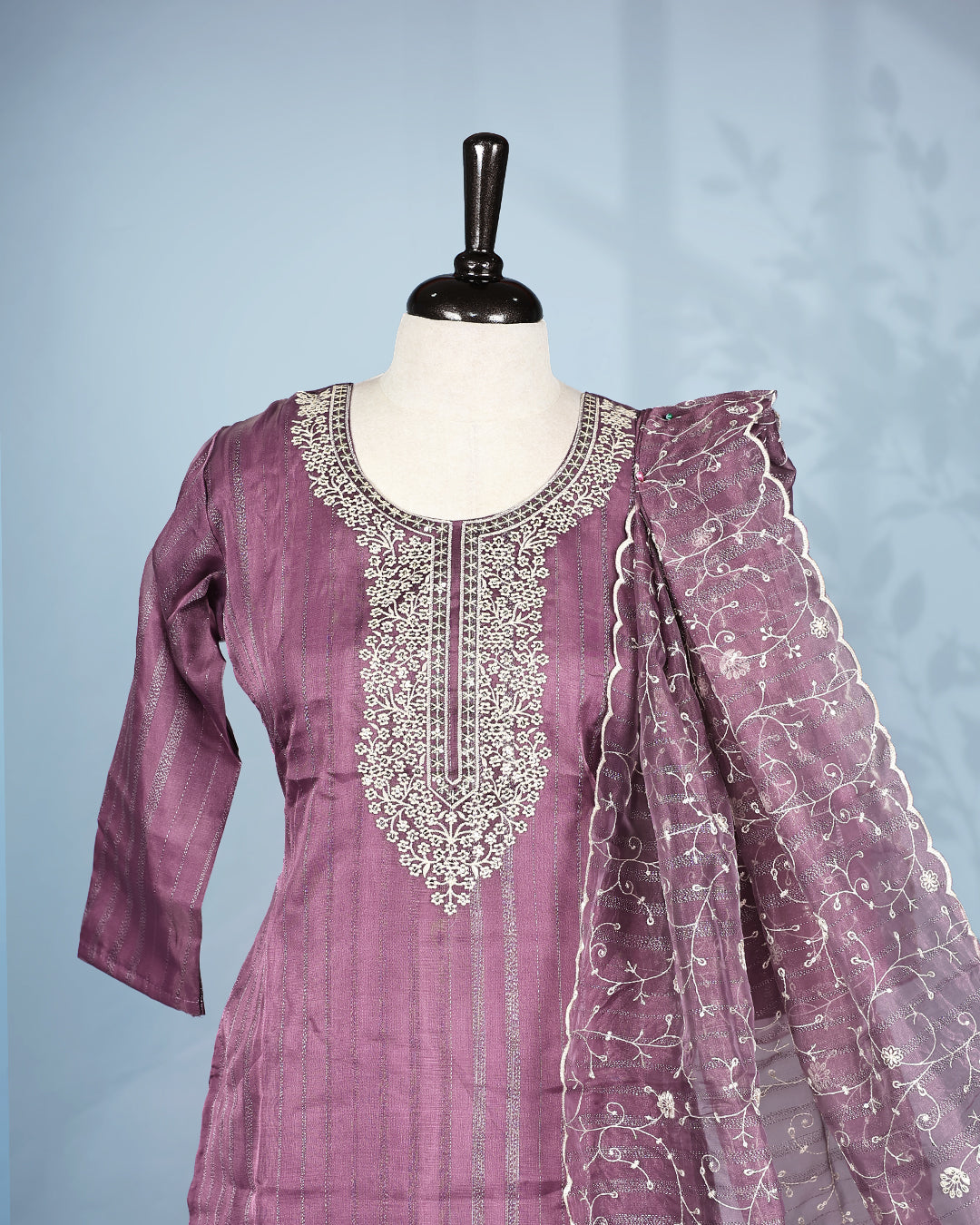 Purple colour salwar set with Sequins & thread work on top, paired with matching bottom & Dupatta.