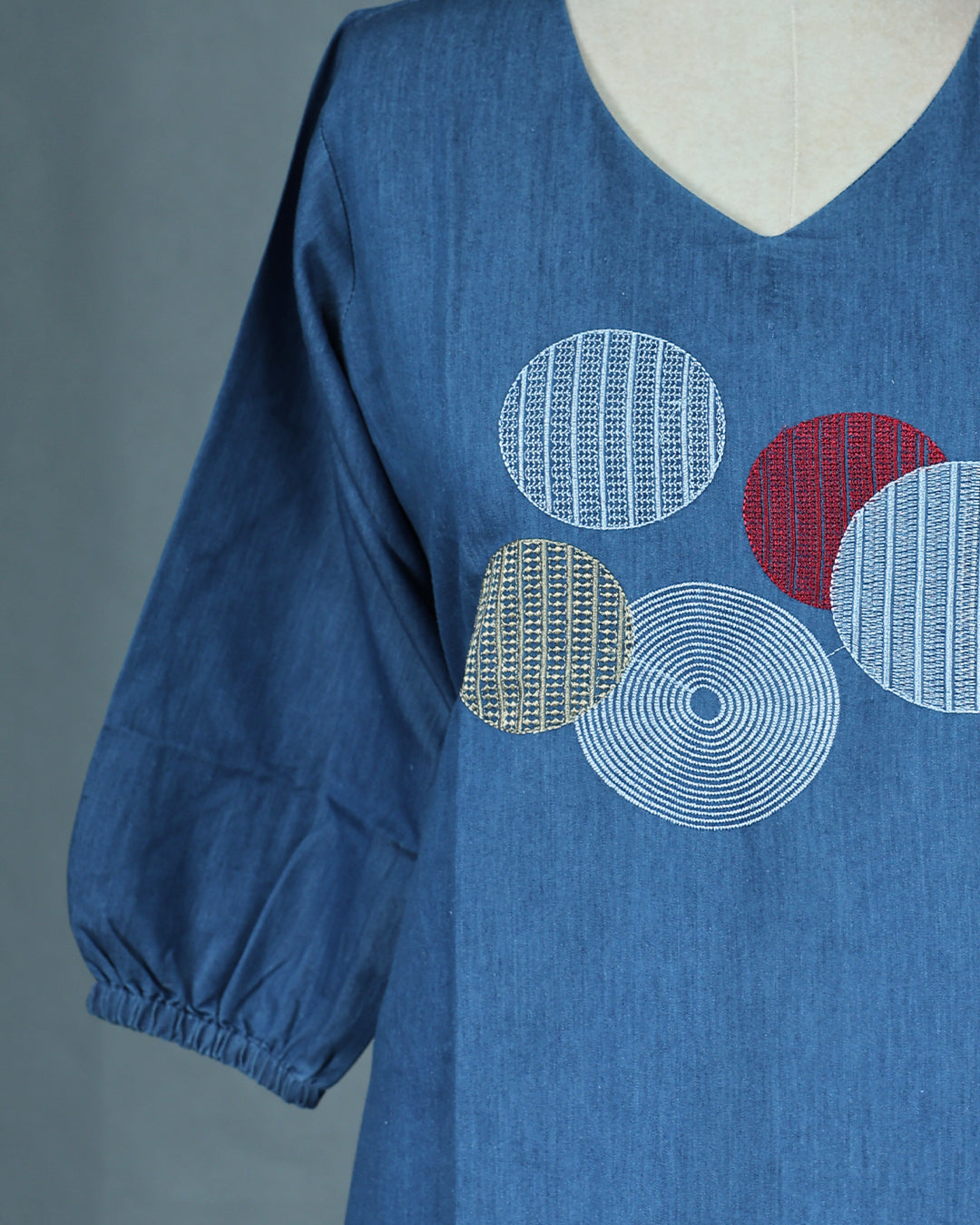 Light Blue Denim Design Colour Kurti featuring Thread Geometric Work On body , a U neckline, With sleeve.
