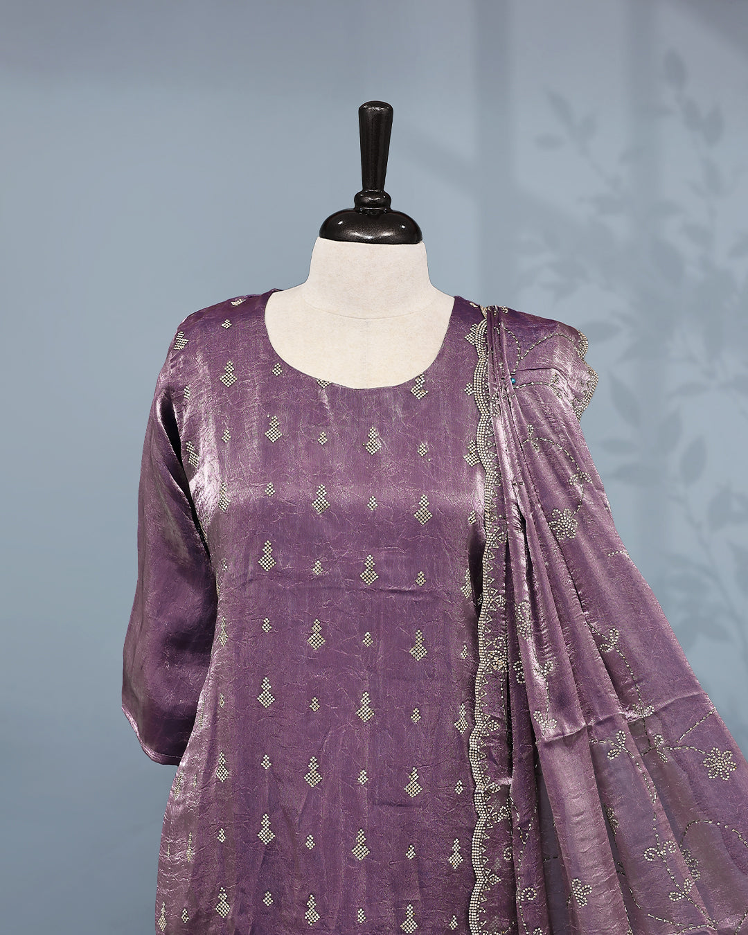 Lavender colour salwar set with Stone work on top, paired with matching bottom & Dupatta.