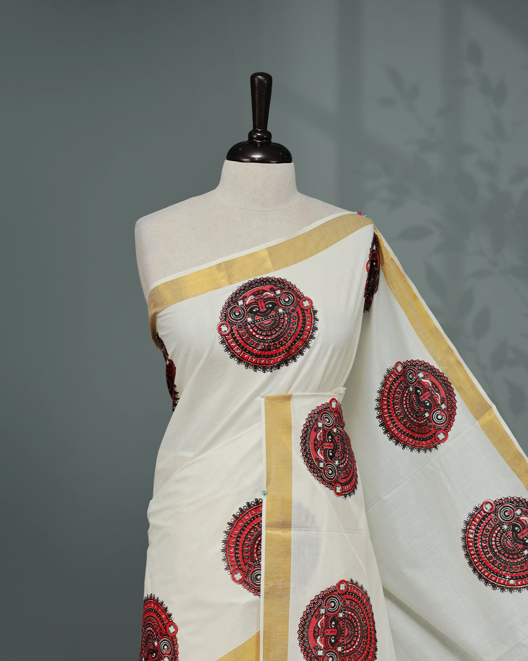 Cream colour Kerala saree Featuring an Elegant plain body, complemented by a classic gold zari with Indian art form print on border, matching blouse piece.