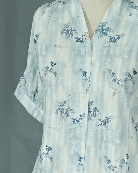 Light Blue colour Top with Leaf Print work on body, collar design, With sleeve.