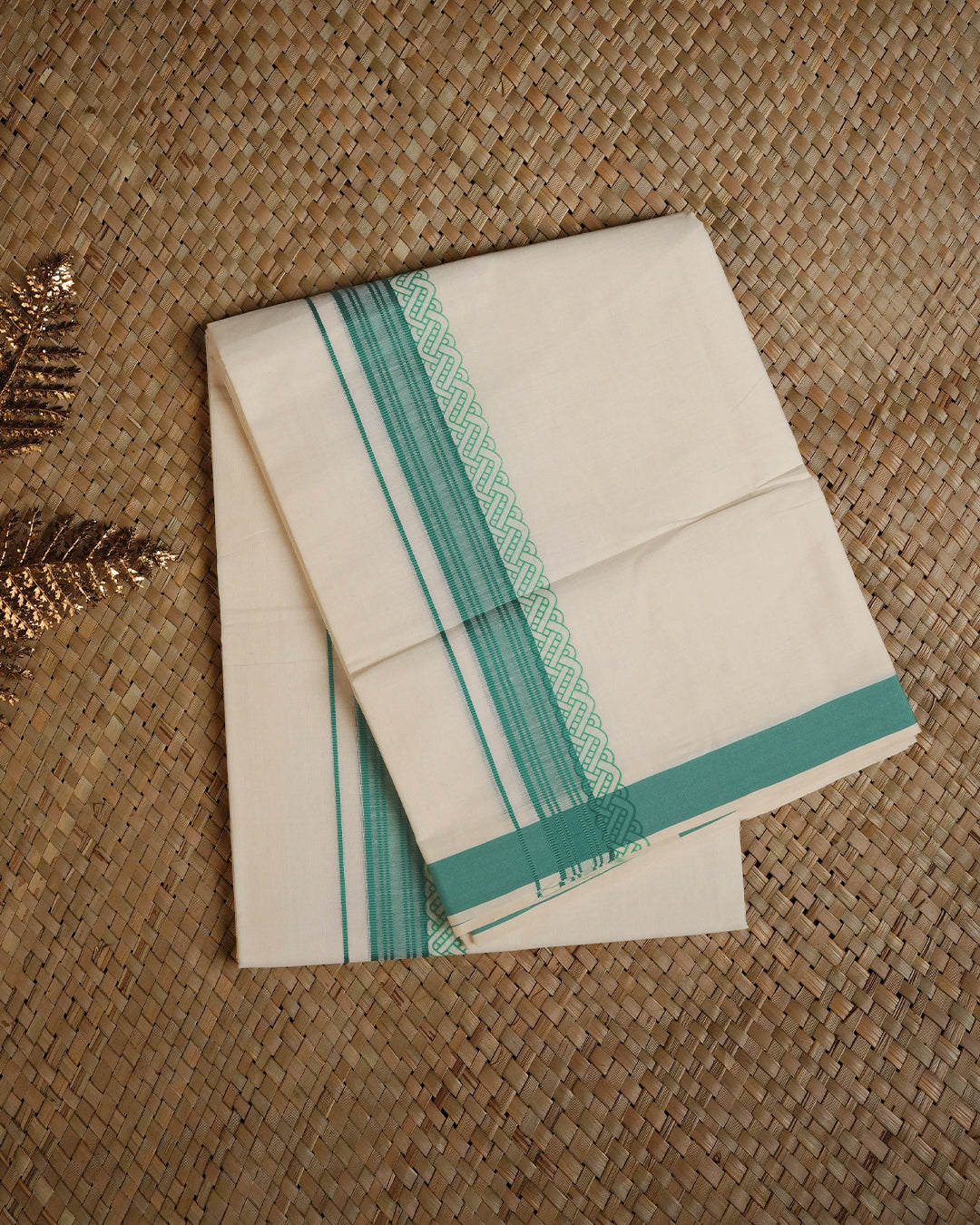 Cream colour cotton Double dhoti featuring Green border with print.