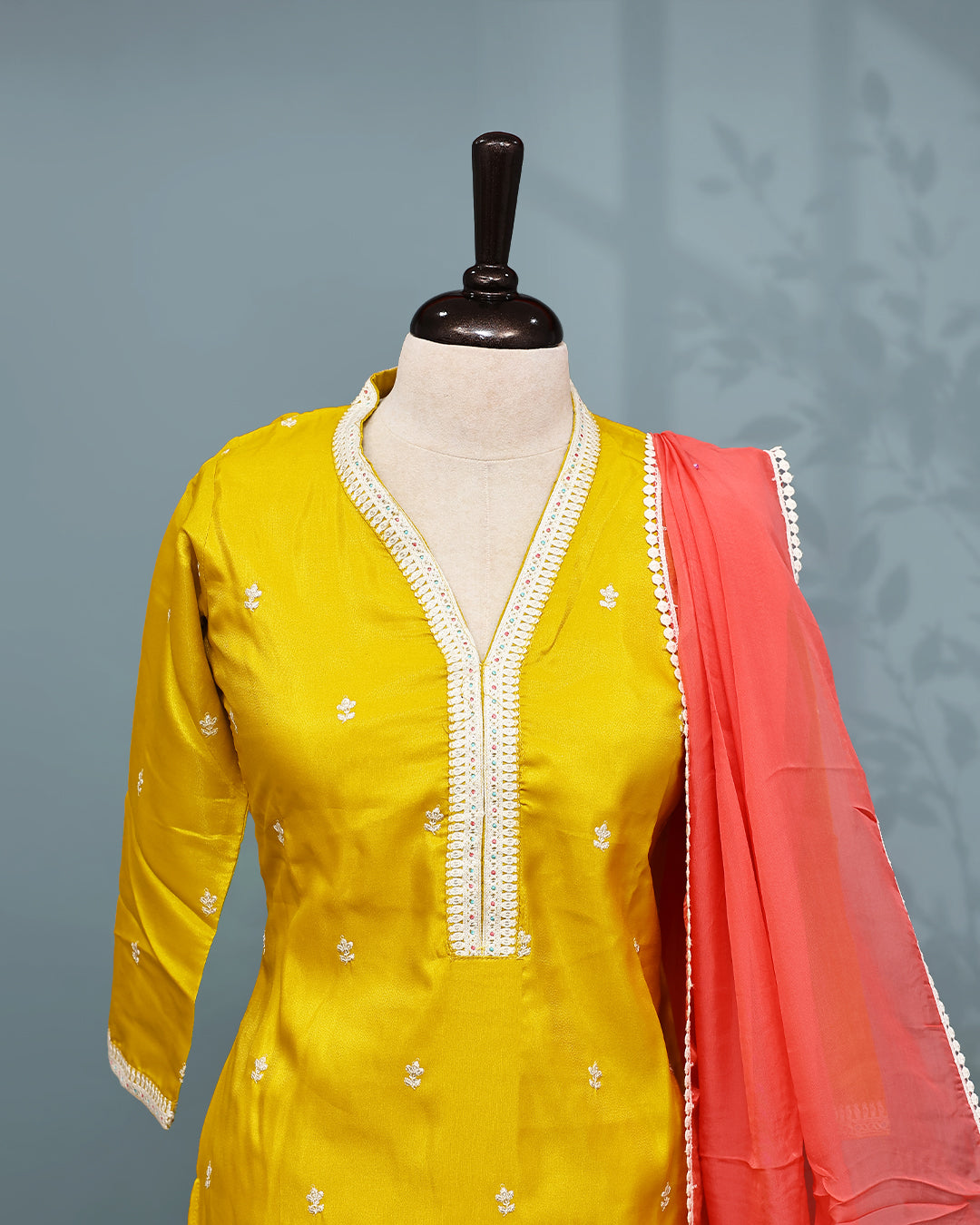 Yellow colour Salwar set comes top with Thread & Sequins work on body, paired with matching bottom and contrast dupatta.