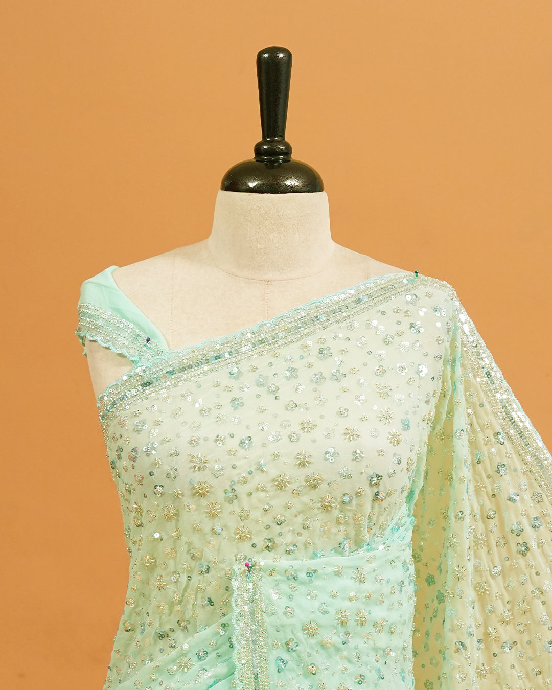 Mint colour Organza saree with Cut Beats & Sequins.